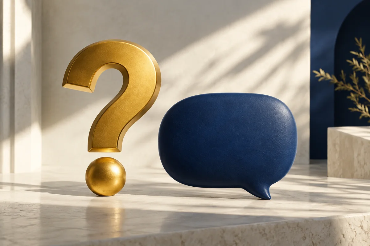 Sculptural golden question mark beside a navy speech bubble